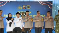 Kapolres Karawang AKBP Fiki N Ardinsyah Meresmikan Program Rulahu Dan Jembatan Di Dusun Krajan